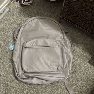 Grey NWT calpak travel “Glenroe” backpack tons of pockets